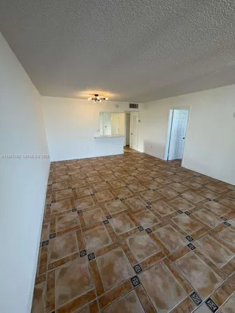 a view of a big room with wooden floor