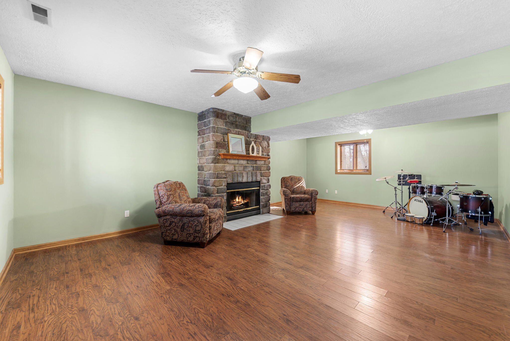 6613 West 86th Court Crown Point, IN 46307 - Photo 16 of 23 a living room with furniture and wooden floor