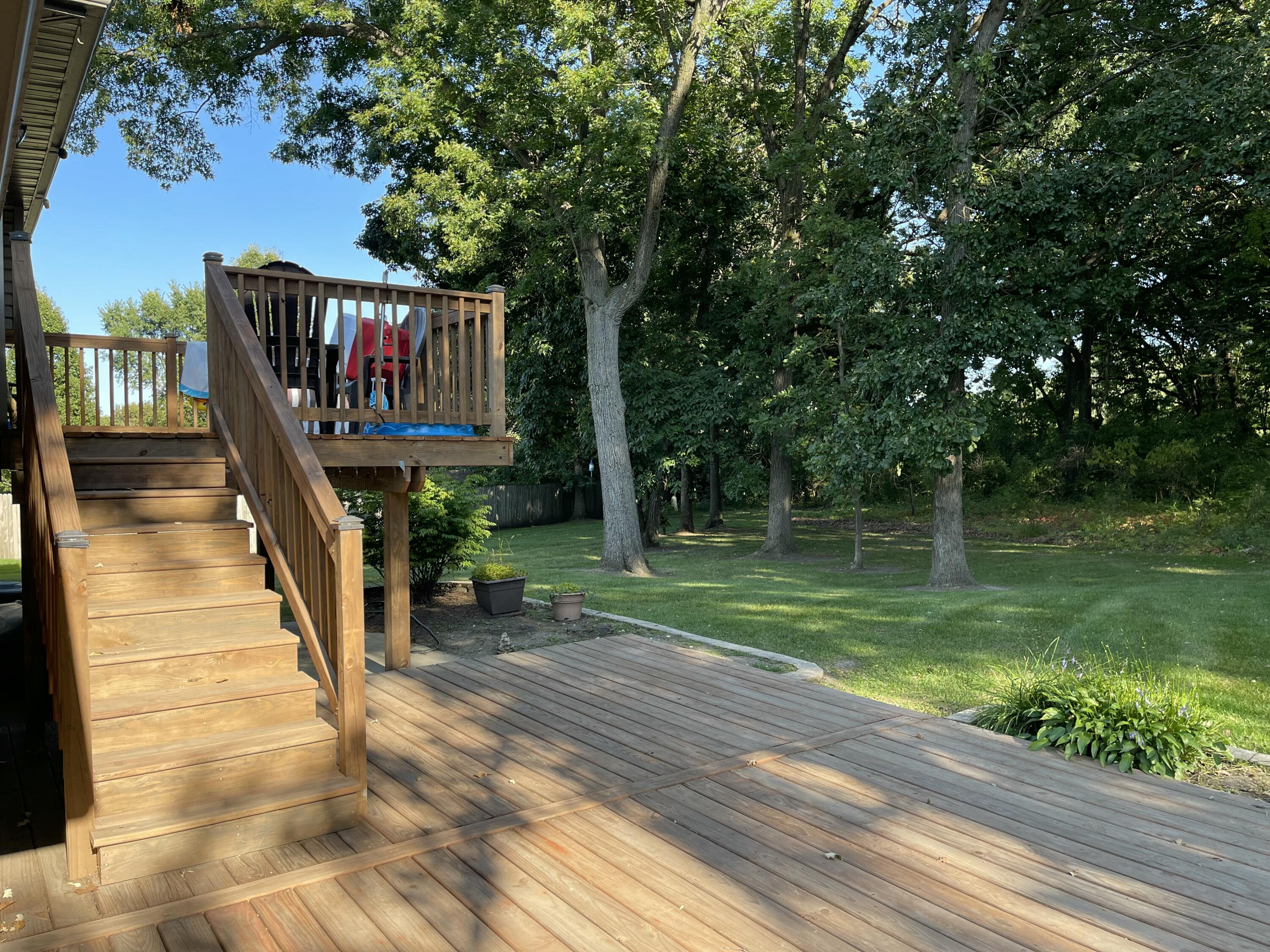 6613 West 86th Court Crown Point, IN 46307 - Photo 22 of 23 a view of a house with backyard and a sitting area