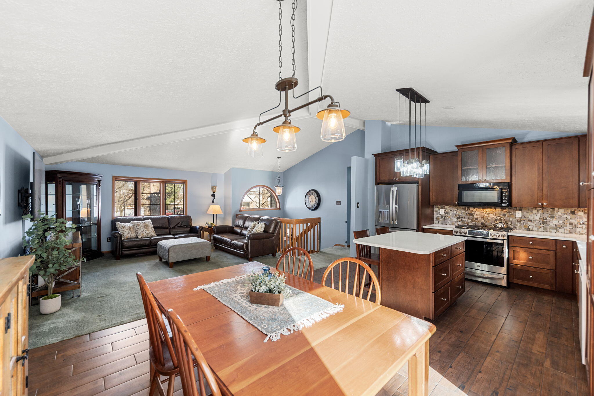 6613 West 86th Court Crown Point, IN 46307 - Photo 7 of 23 a view of a dining room with furniture window and wooden floor