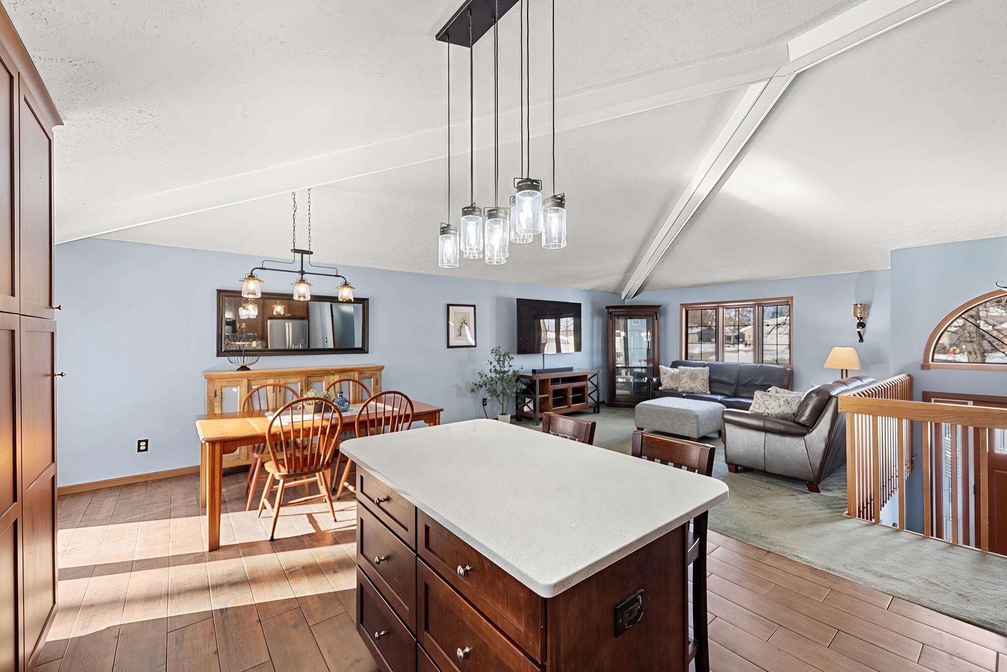 6613 West 86th Court Crown Point, IN 46307 - Photo 10 of 23 a view of a dining room with furniture a chandelier and wooden floor