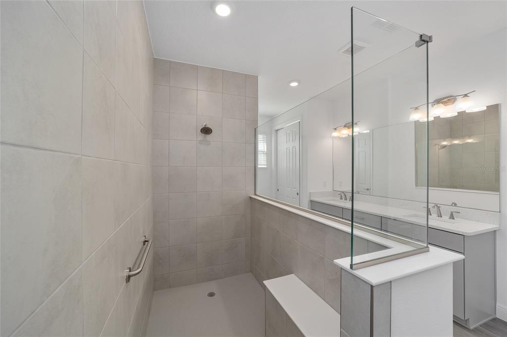 10104 Southwest 106th Circle Ocala, FL 34481 - Photo 29 of 47 a bathroom with a shower and a sink