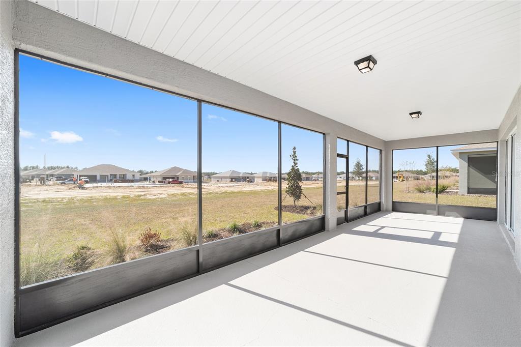 10104 Southwest 106th Circle Ocala, FL 34481 - Photo 44 of 47 a living room with large windows