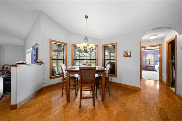 a view of a living room and dining room