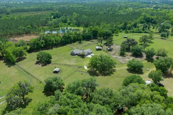 a backyard of a house with lots of green space