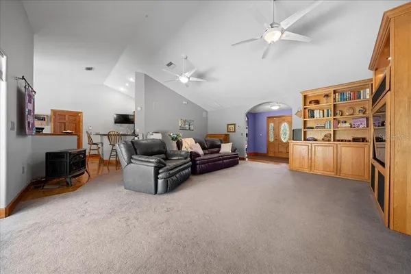 a kitchen with stainless steel appliances granite countertop a sink and cabinets