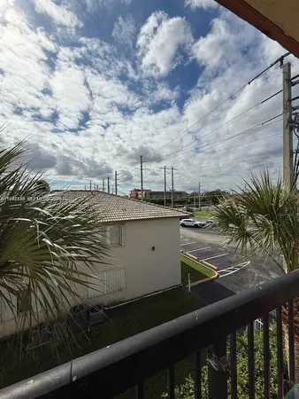 a view of a lake from a balcony