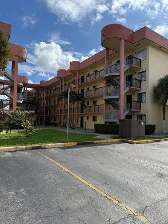 a front view of a building with a street