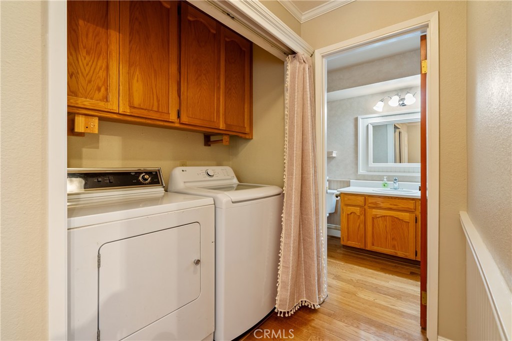 6815 Santa Lucia Road, Unit 5 Atascadero, CA 93422 - Photo 7 of 44 First-floor laundry area sets away from the main living area and near the garage.