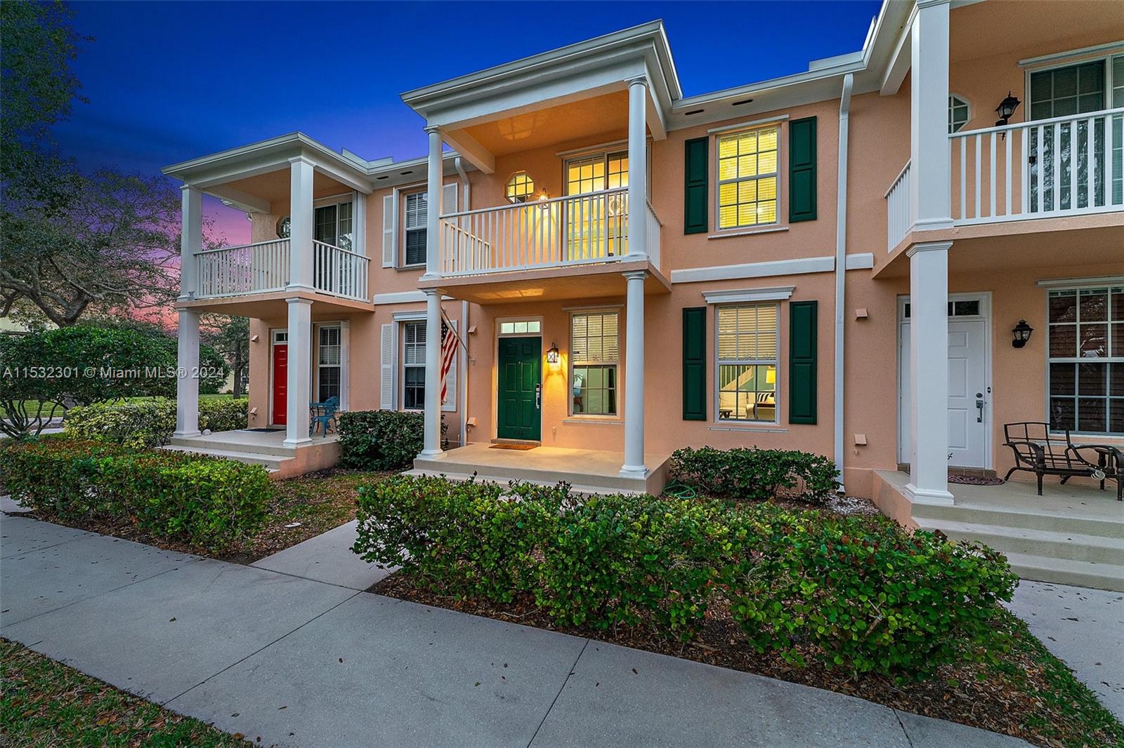 136 Milbridge Drive Jupiter, FL 33458 - Photo 1 of 50 a front view of a multi story residential apartment building