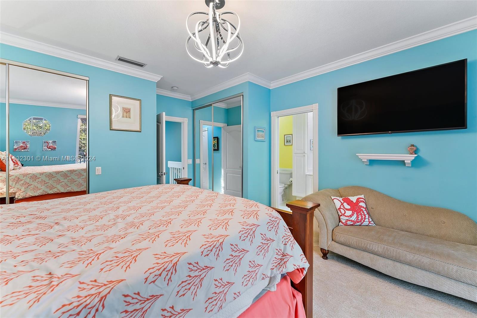 136 Milbridge Drive Jupiter, FL 33458 - Photo 30 of 50 a bedroom with a bed and a flat screen tv