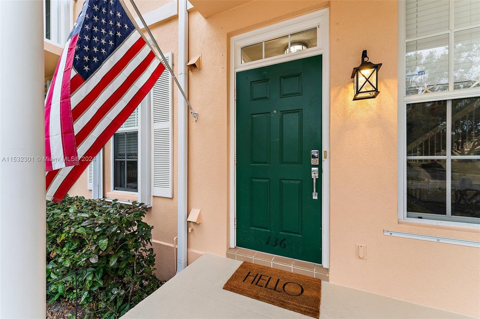 136 Milbridge Drive Jupiter, FL 33458 - Photo 3 of 50 a front view of a house with a yard