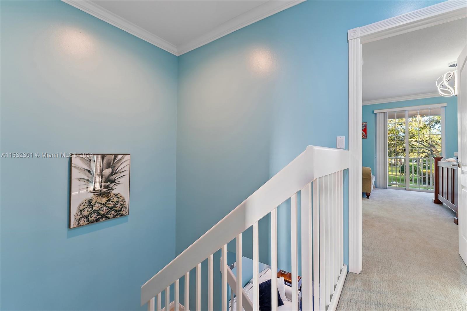 136 Milbridge Drive Jupiter, FL 33458 - Photo 35 of 50 a view of a hallway with windows