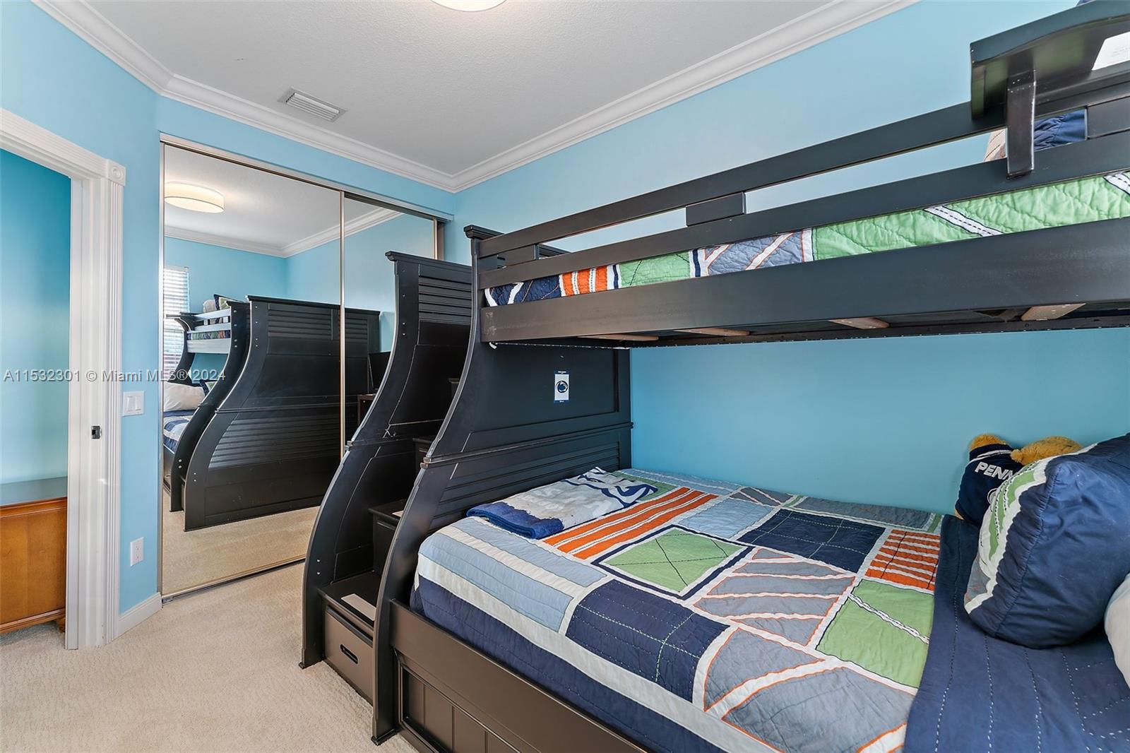 136 Milbridge Drive Jupiter, FL 33458 - Photo 41 of 50 a room with furniture and wooden floor