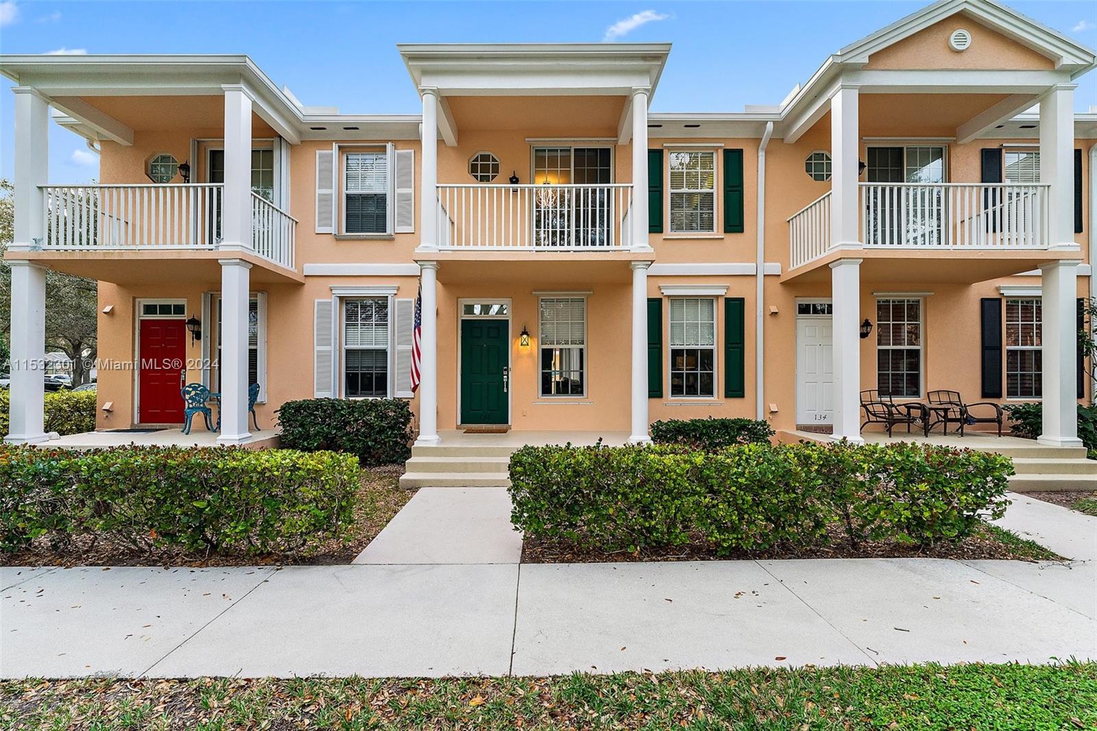 136 Milbridge Drive Jupiter, FL 33458 - Photo 5 of 50 front view of a brick house