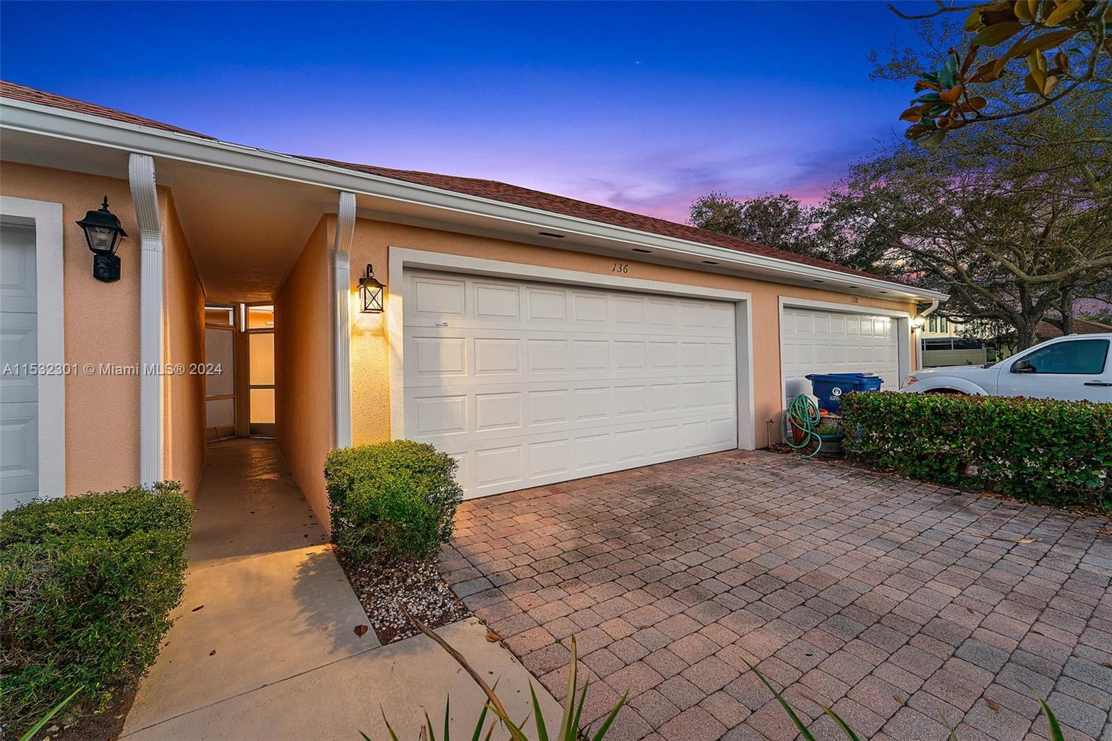 136 Milbridge Drive Jupiter, FL 33458 - Photo 7 of 50 a front view of a house