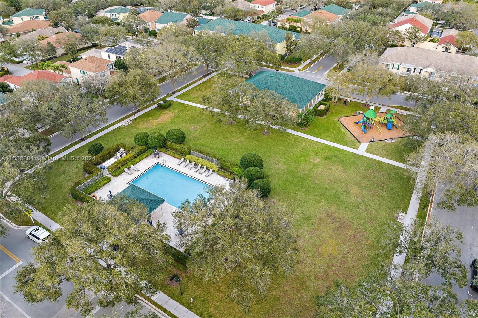 136 Milbridge Drive Jupiter, FL 33458 - Photo 9 of 50 an aerial view of a residential houses with outdoor space