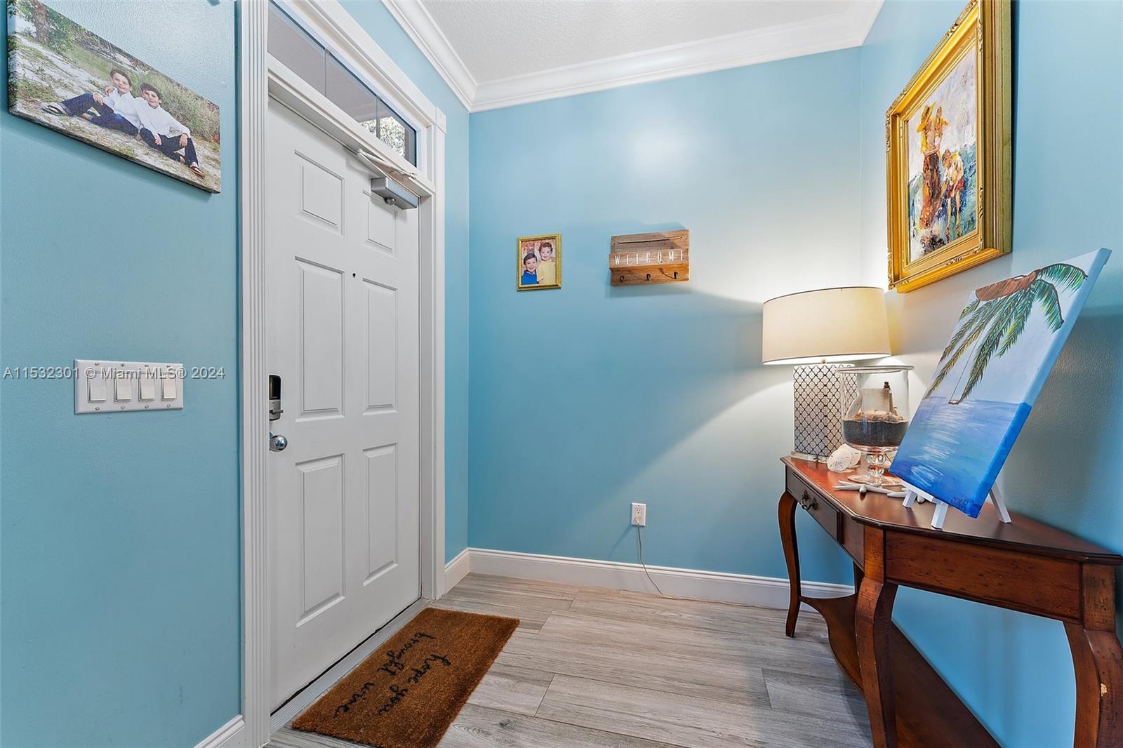 136 Milbridge Drive Jupiter, FL 33458 - Photo 10 of 50 a view of room with furniture and wooden floor