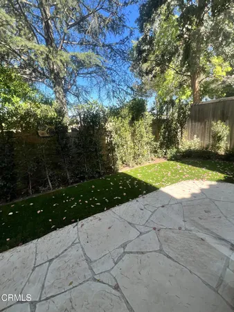 a view of backyard with green space