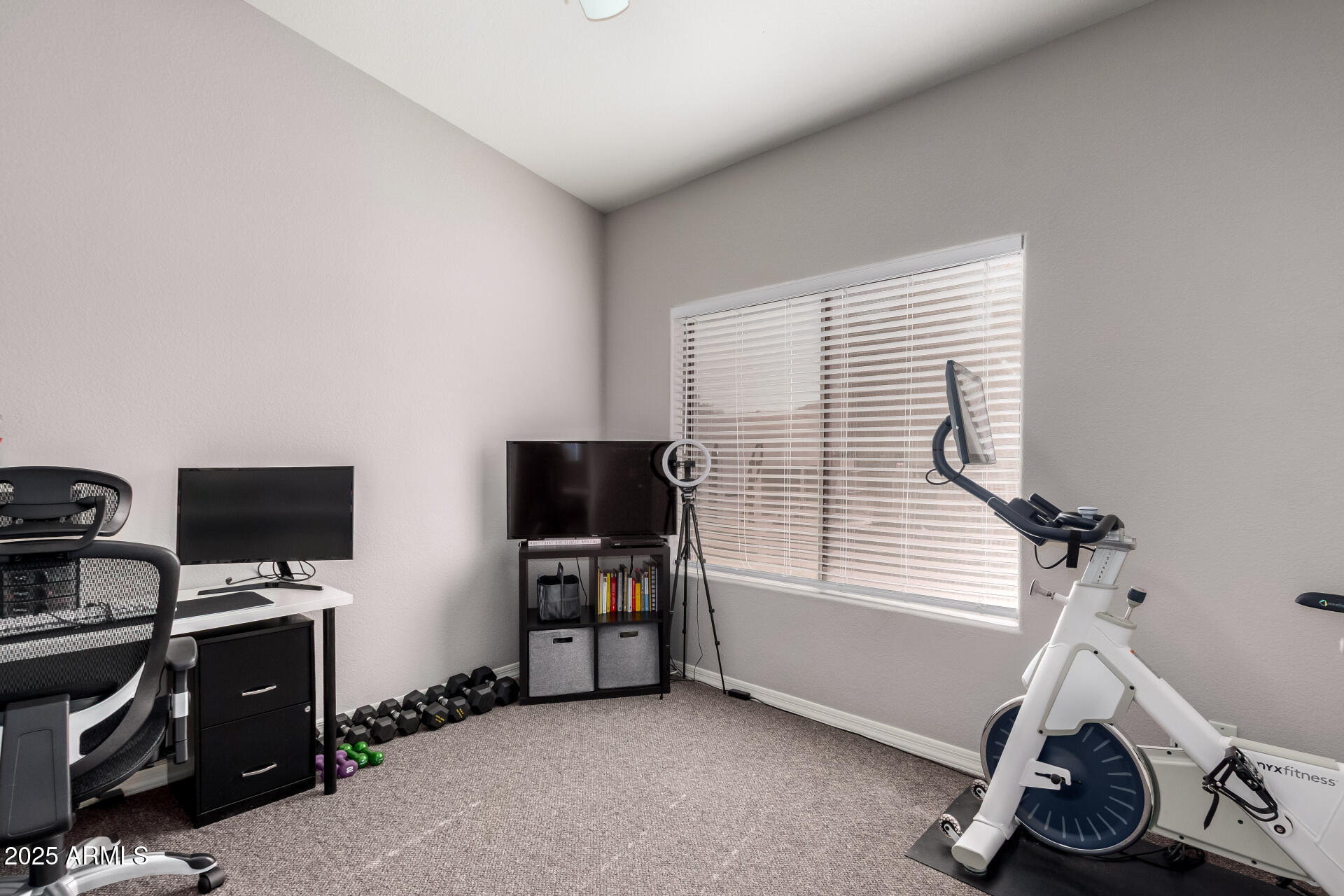 1406 West Emerald Avenue, Unit 102 Mesa, AZ 85202 - Photo 13 of 21 a view of a workspace with furniture and a window