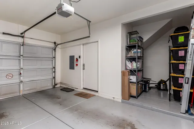 a view of room with workspace and closet