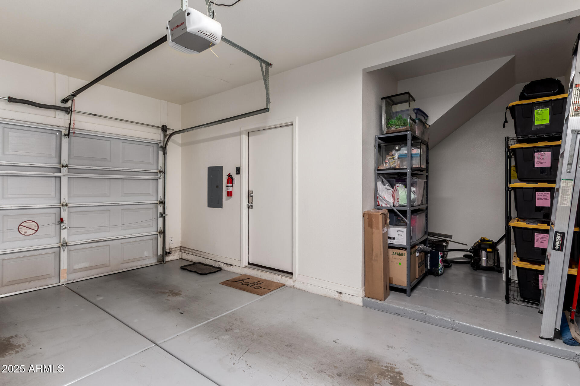1406 West Emerald Avenue, Unit 102 Mesa, AZ 85202 - Photo 19 of 21 a view of room with workspace and closet
