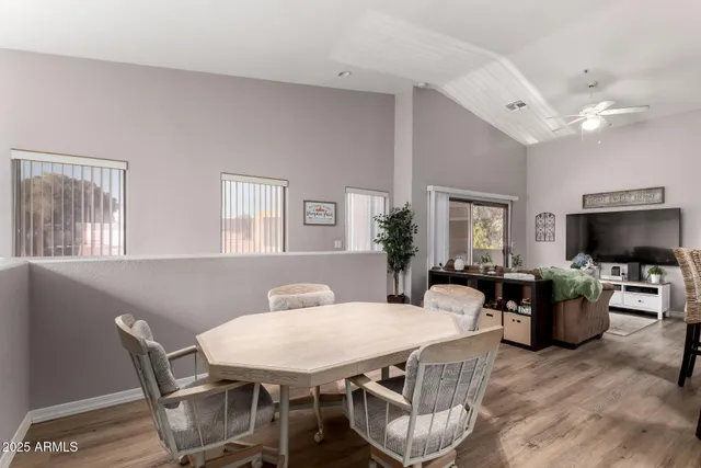 a view of a dining room with furniture