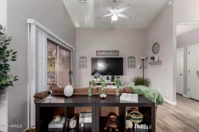 a view of a workspace with furniture