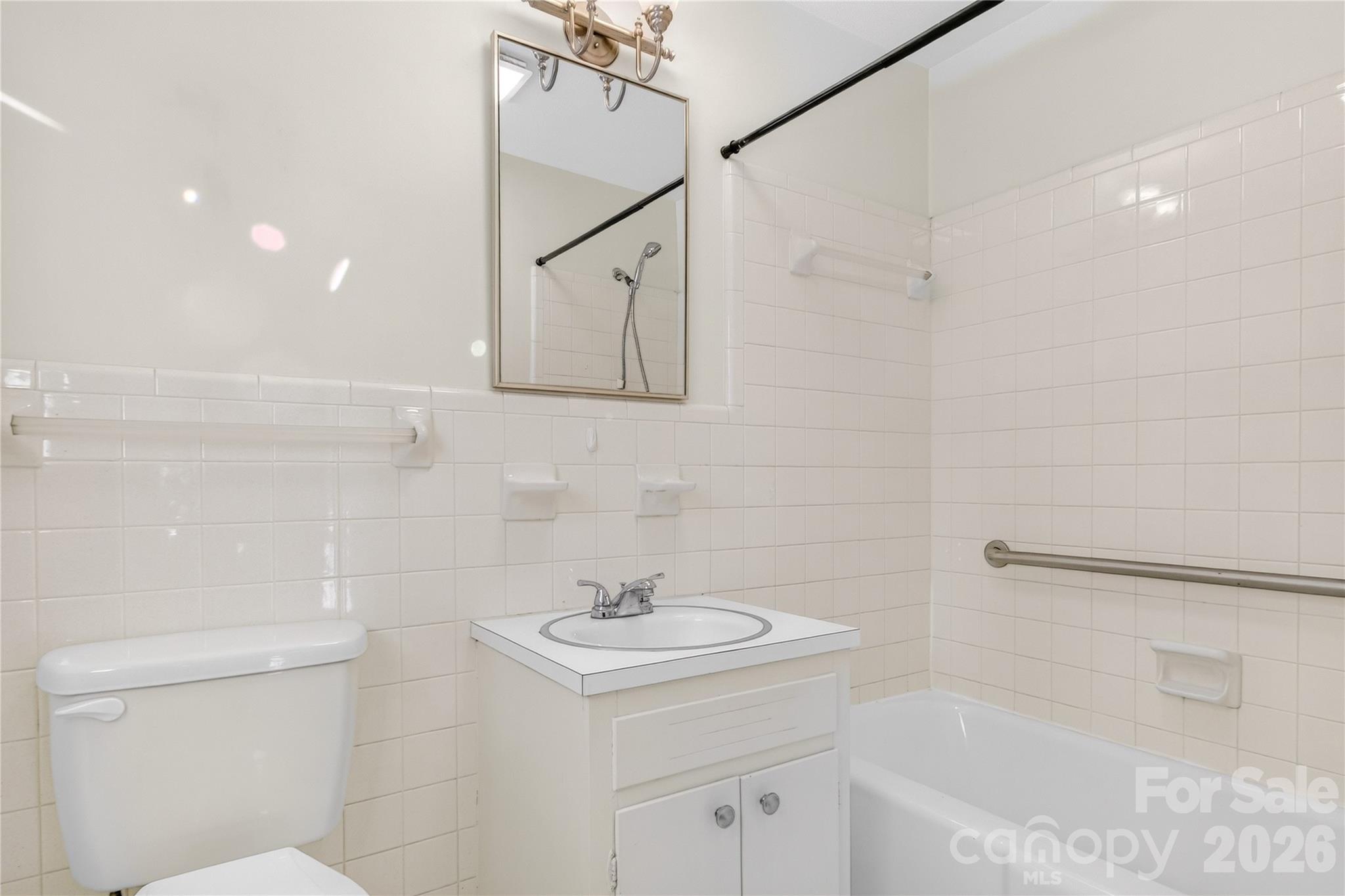852 Fieldstone Road Mooresville, NC 28115 - Photo 20 of 34 a bathroom with a sink a toilet and shower