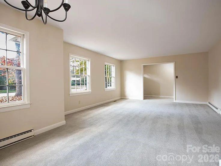 852 Fieldstone Road Mooresville, NC 28115 - Photo 3 of 13 a view of an empty room with a window