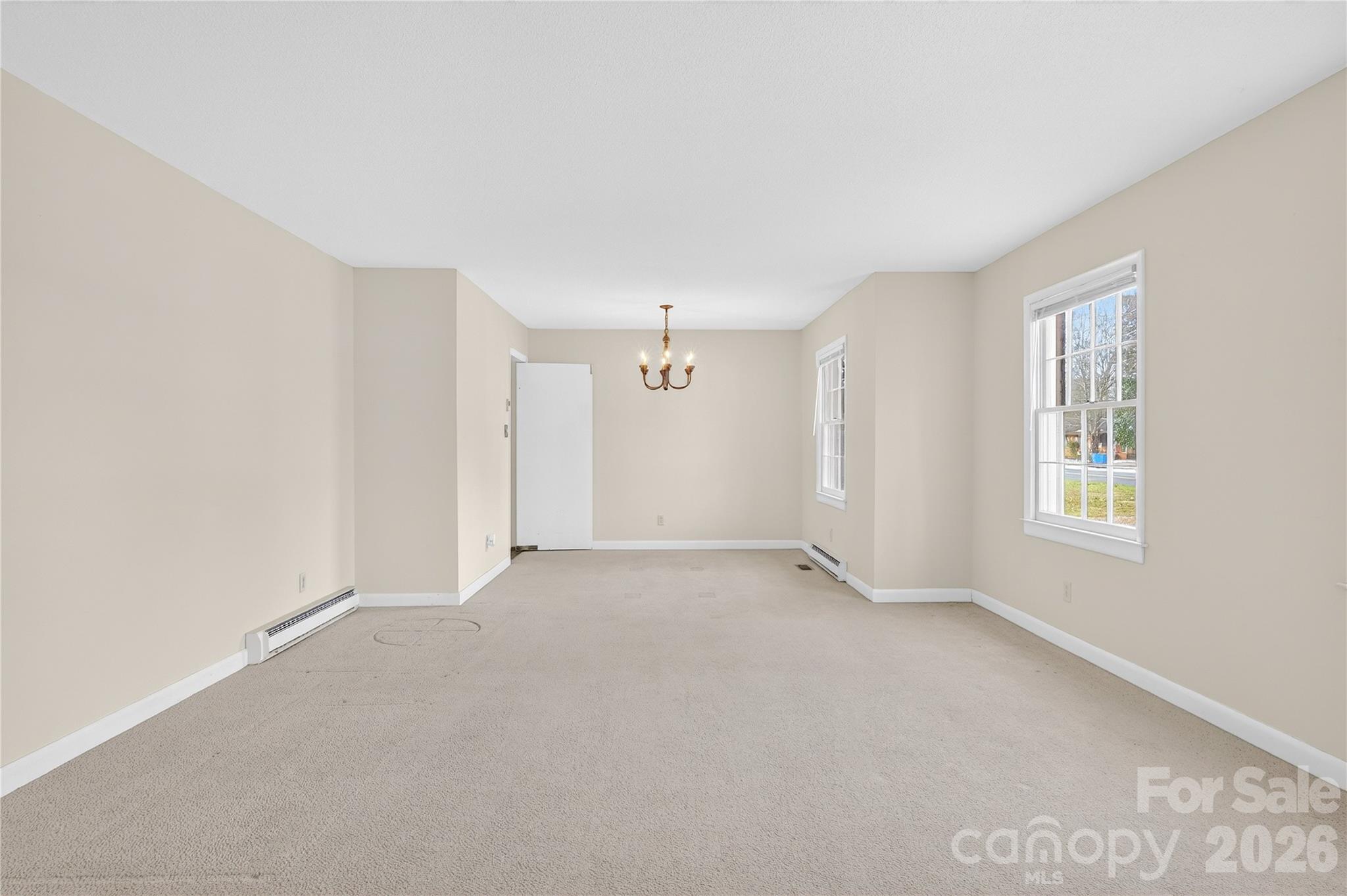 852 Fieldstone Road Mooresville, NC 28115 - Photo 4 of 34 an empty room with windows