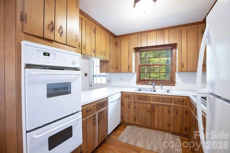 852 Fieldstone Road Mooresville, NC 28115 - Photo 6 of 13 a kitchen with a sink stove and cabinets