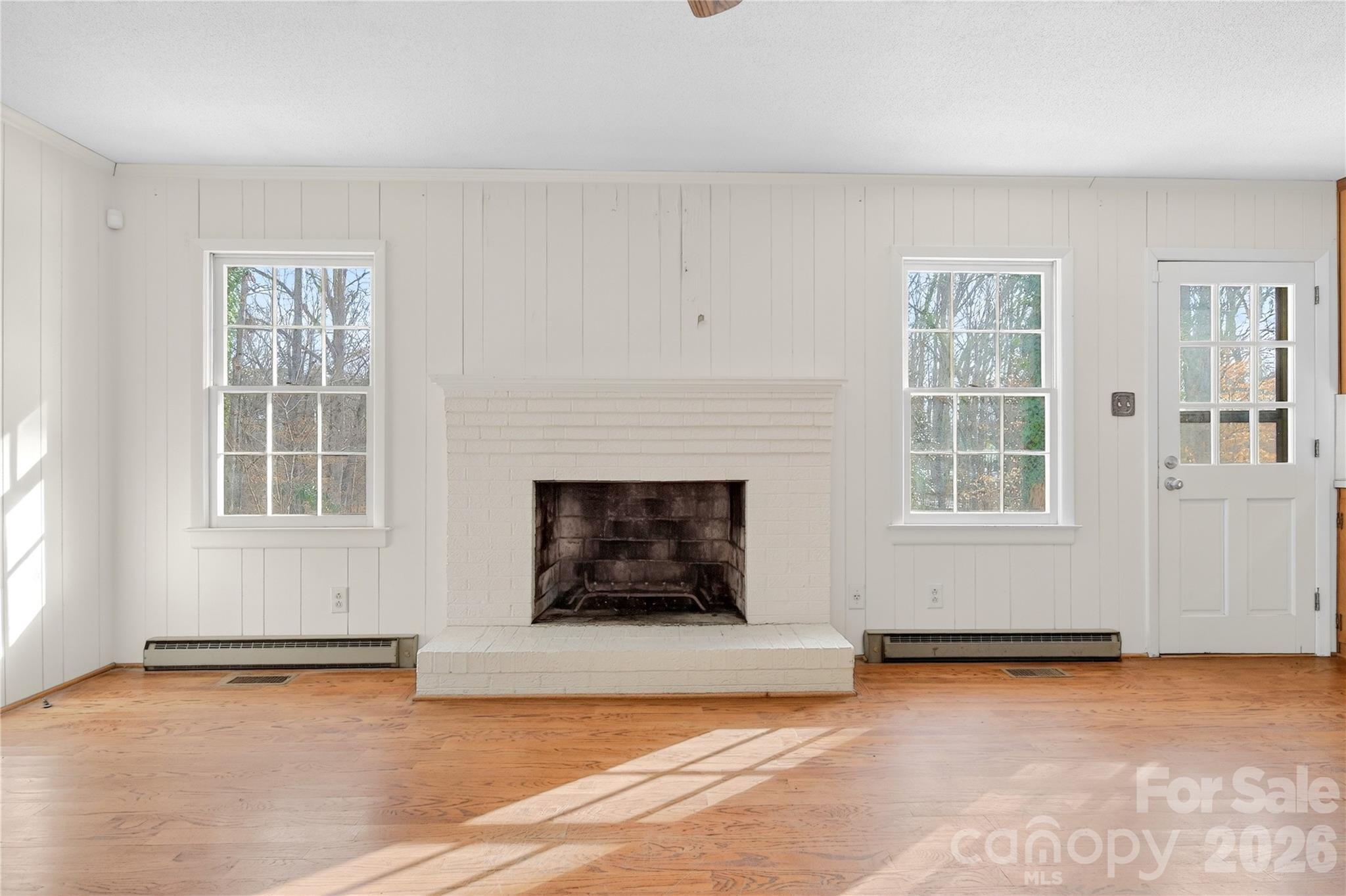 852 Fieldstone Road Mooresville, NC 28115 - Photo 7 of 34 a living room with furniture and a fireplace