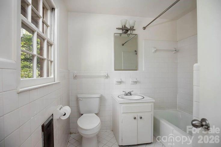 852 Fieldstone Road Mooresville, NC 28115 - Photo 9 of 13 a bathroom with a sink toilet and shower