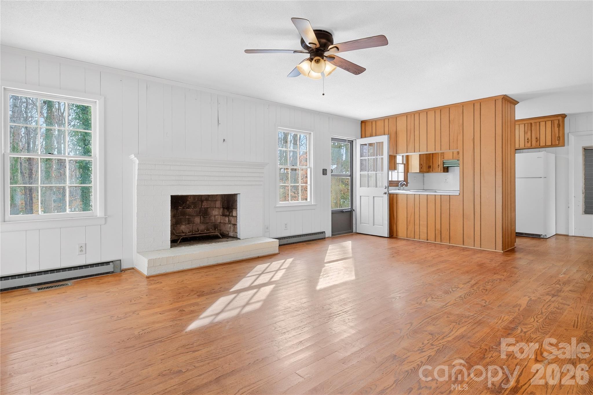 852 Fieldstone Road Mooresville, NC 28115 - Photo 10 of 34 a view of an empty room with a window and fireplace