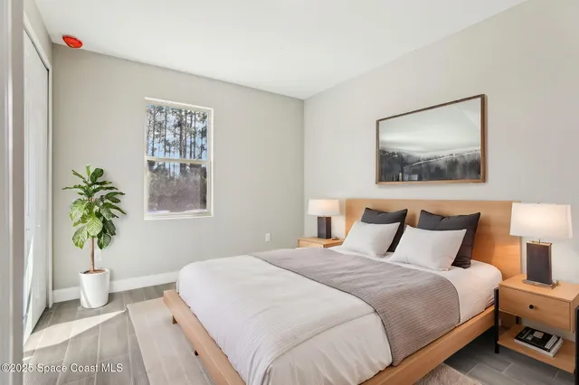 a kitchen with kitchen island a sink stainless steel appliances and cabinets