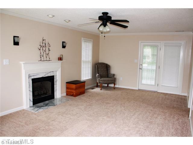 4203 Beacon Ridge Drive High Point, NC 27265 - Photo 2 of 16 Living Room. Large living area with fireplace!