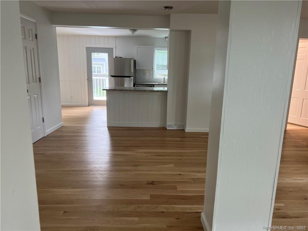 144 Rakoczy Avenue Fairfield, CT 06824 - Photo 18 of 19 a view of a kitchen from the hallway