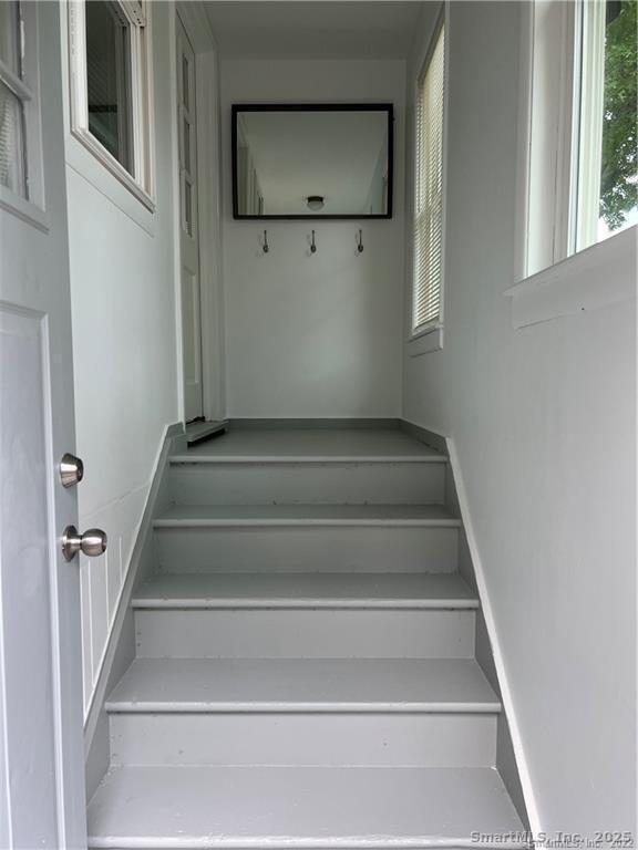 144 Rakoczy Avenue Fairfield, CT 06824 - Photo 2 of 19 a view of staircase with white walls