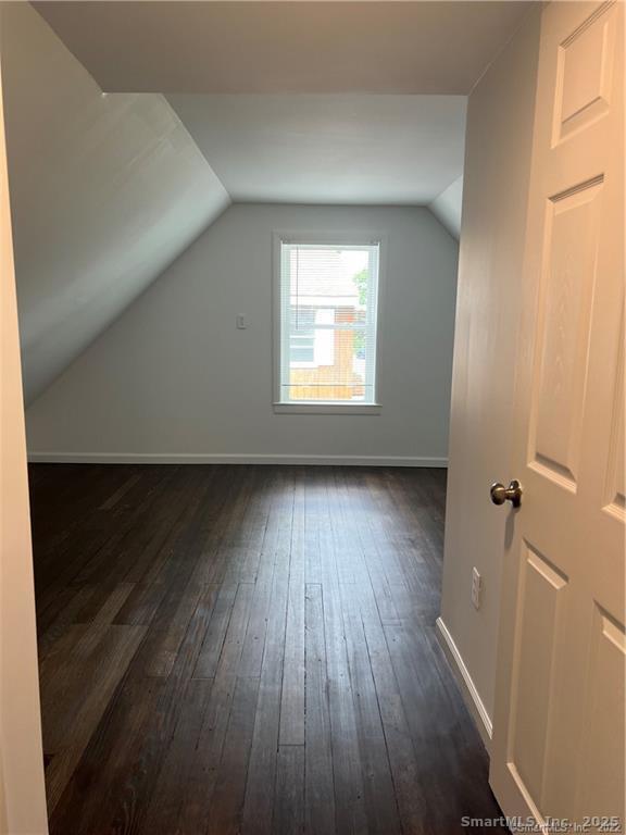 144 Rakoczy Avenue Fairfield, CT 06824 - Photo 10 of 19 wooden floor in an empty room with a window