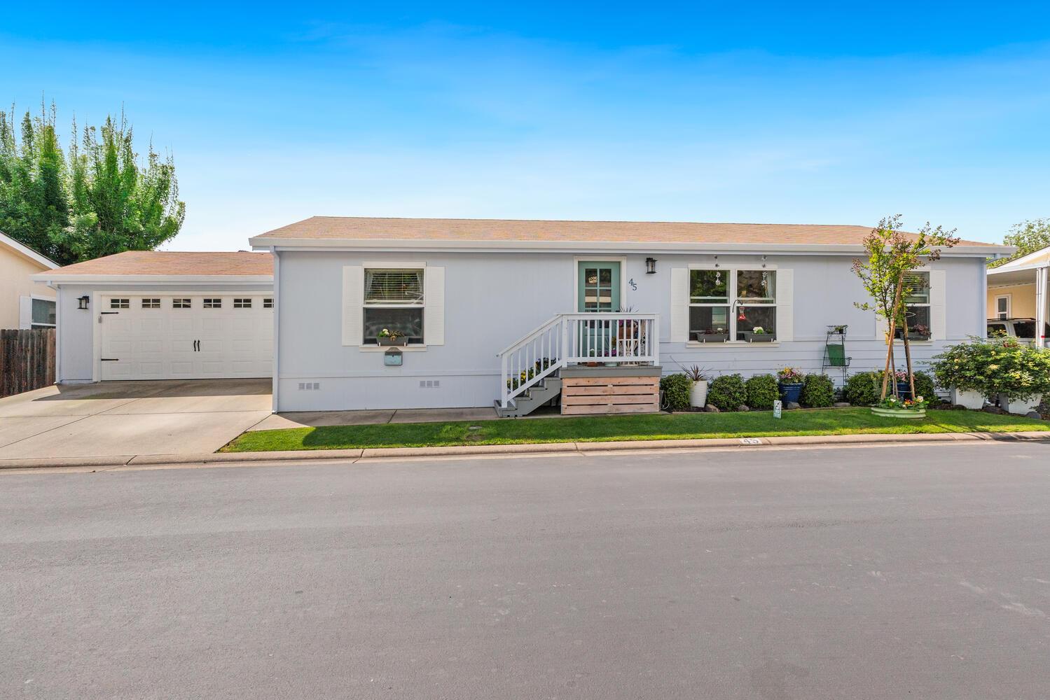 1400 West Marlette Street, Unit 45 Ione, CA 95640 - Photo 1 of 41 a house view with a sitting space and garden view