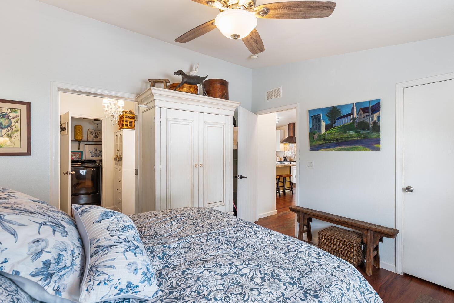 1400 West Marlette Street, Unit 45 Ione, CA 95640 - Photo 17 of 41 a bedroom with a bed and a chandelier