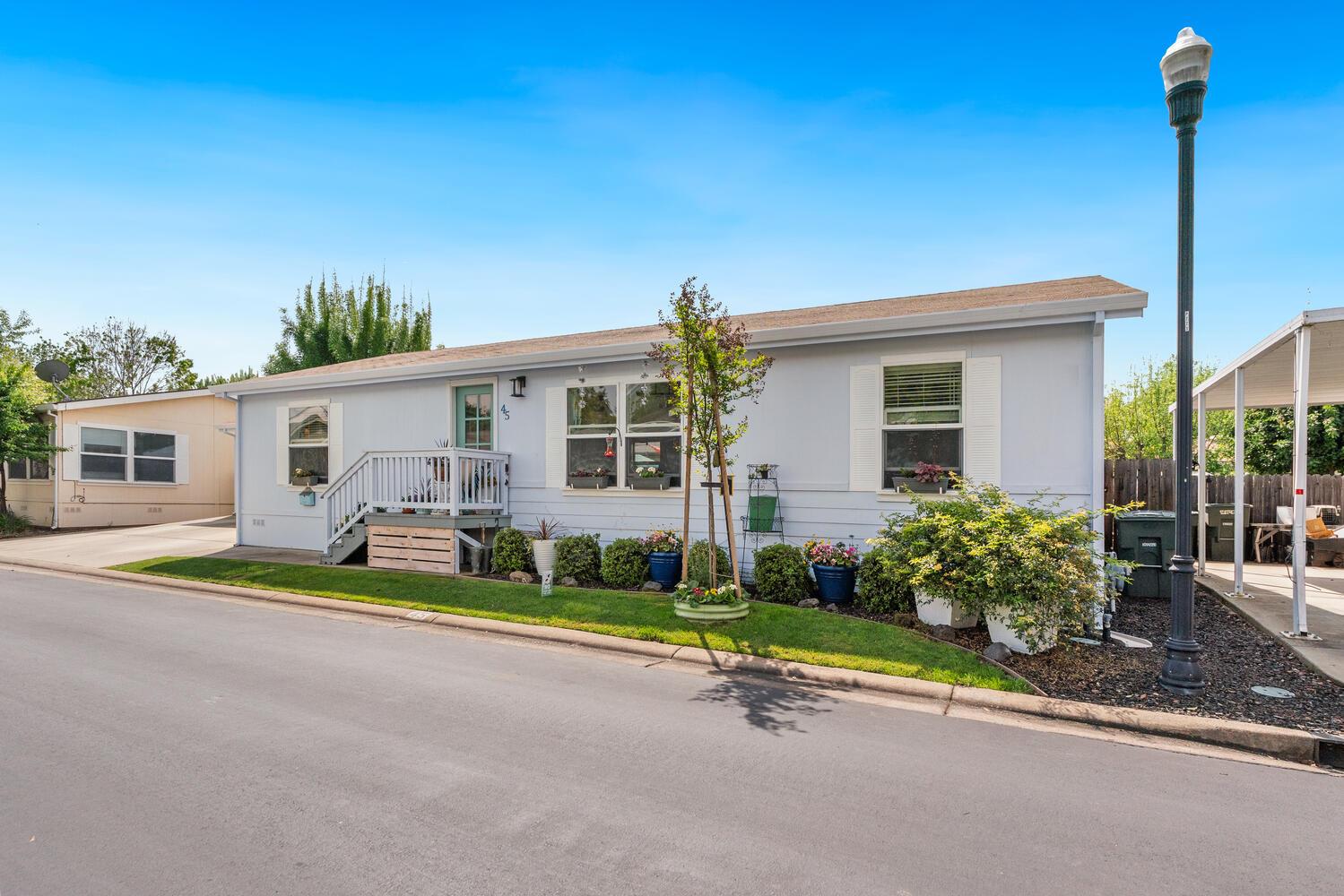 1400 West Marlette Street, Unit 45 Ione, CA 95640 - Photo 2 of 41 a view of a house with backyard and porch