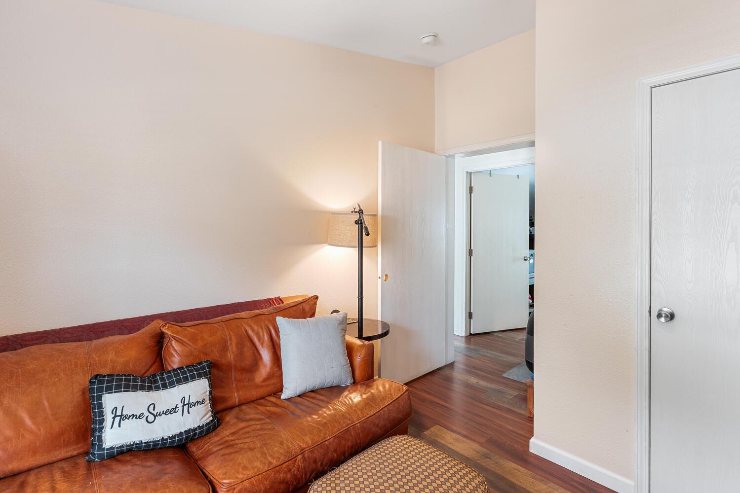 1400 West Marlette Street, Unit 45 Ione, CA 95640 - Photo 22 of 41 a living room with furniture and wooden floor