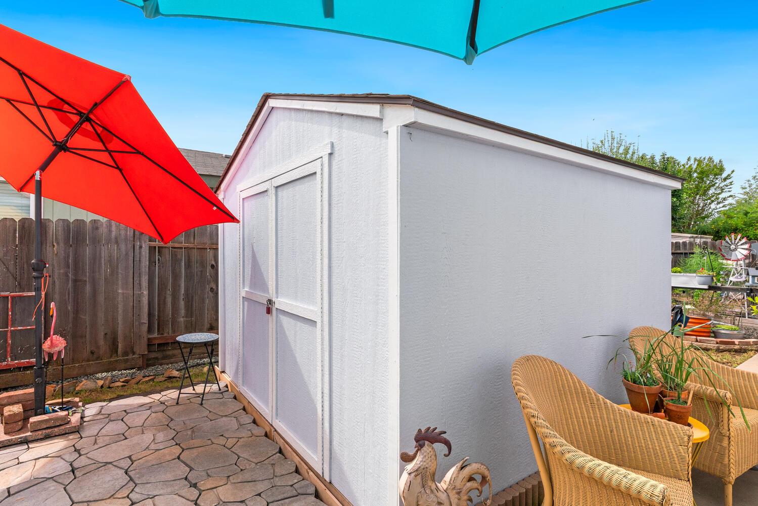 1400 West Marlette Street, Unit 45 Ione, CA 95640 - Photo 30 of 41 a backyard of a house with table and chairs