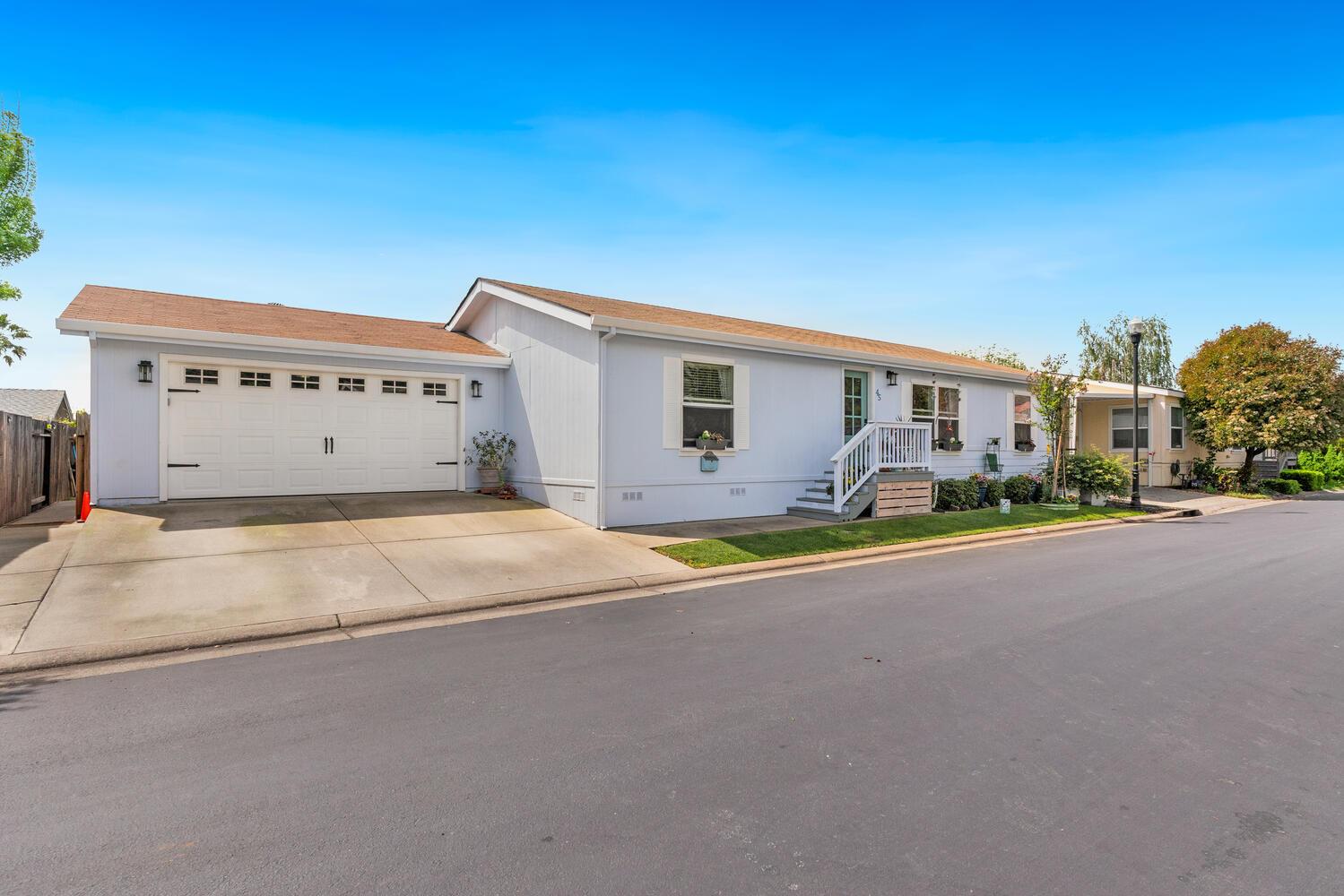 1400 West Marlette Street, Unit 45 Ione, CA 95640 - Photo 3 of 41 a view of the house with a yard