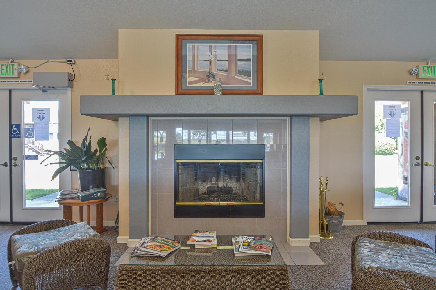 1400 West Marlette Street, Unit 45 Ione, CA 95640 - Photo 36 of 41 a living room with furniture and a fireplace