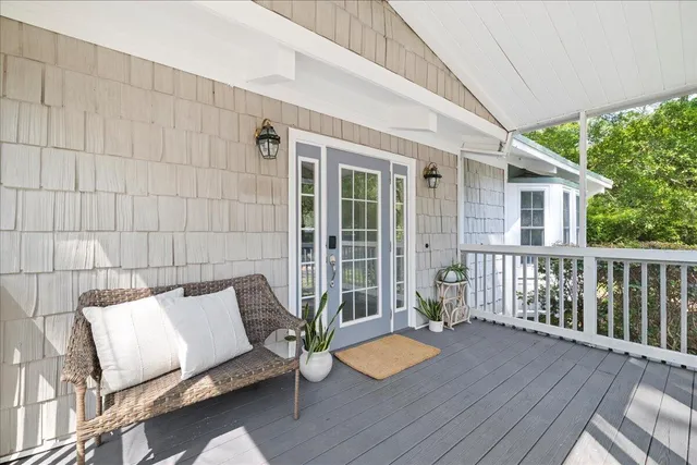 swimming pool view with a seating space