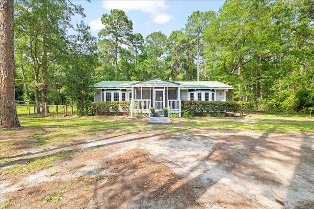 a view of a house with a swimming pool