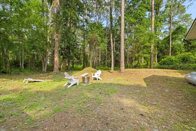 a backyard of a house with lots of green space